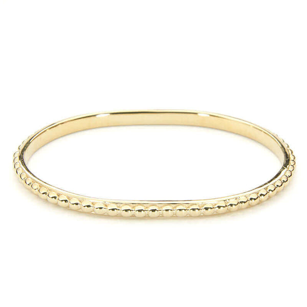 Polished brass beaded bangle bracelet.