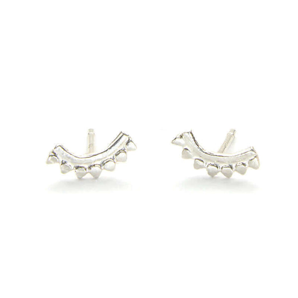 Pair of silver earrings, arc-shaped with little triangular beads.