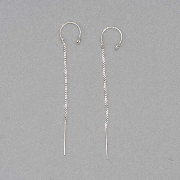 Pair of silver earrings, with open hoop with thin chain hanging down.