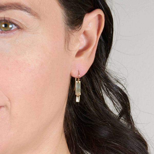 A Woman Wearing Luisa Large Earrings