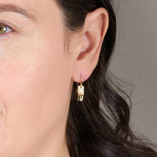 A Woman Wearing Luisa Small Earrings