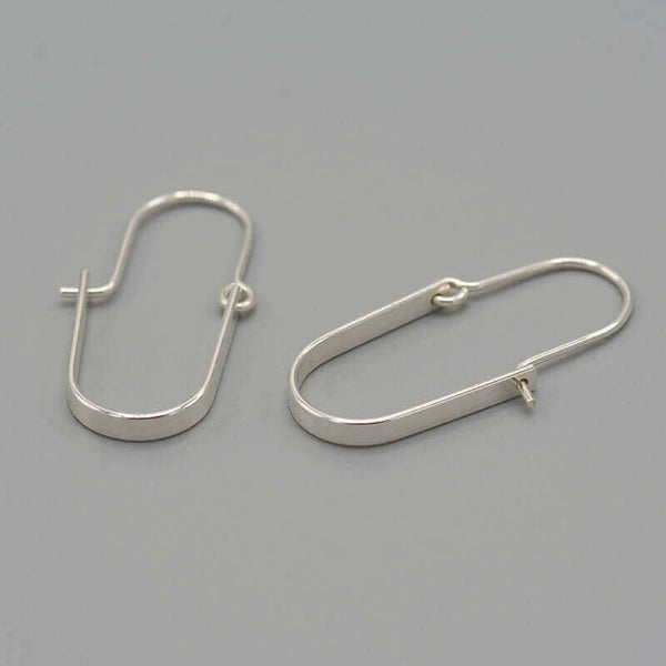 Pair of silver hoop style earrings with curved bar on wire.