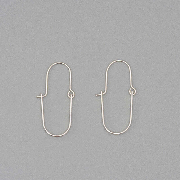 Pair of silver hoop style earrings with curved bar on wire.