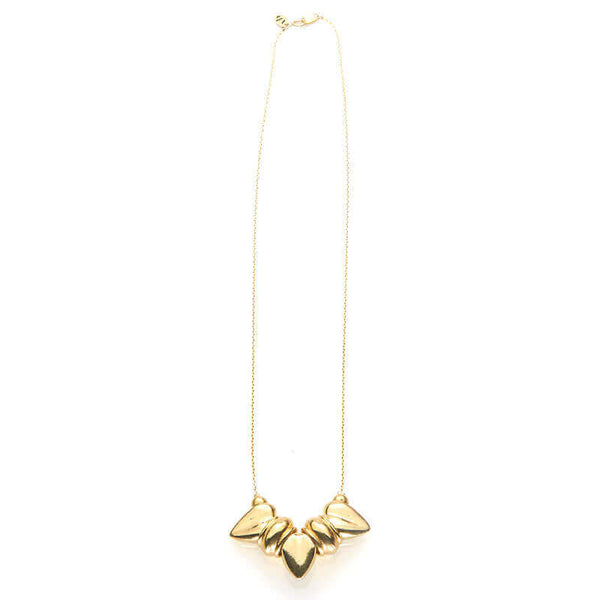 Gold necklace, thin gold chain with pendant of three large heart-shaped beads, full length showing clasp.