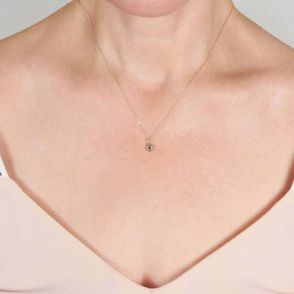 DELIA TINY FLOWER PENDANT NECKLACE