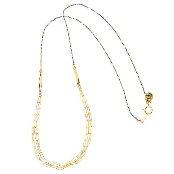 Black chain necklace with 3 delicate elongated link chains at the front.