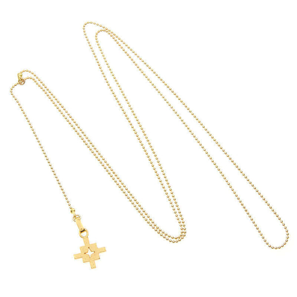 Gold bead chain necklace with small geometric cross shaped pendant and slider.
