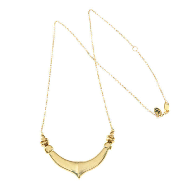 Delicate gold chain necklace with chunky hand cast organic curved pendant.