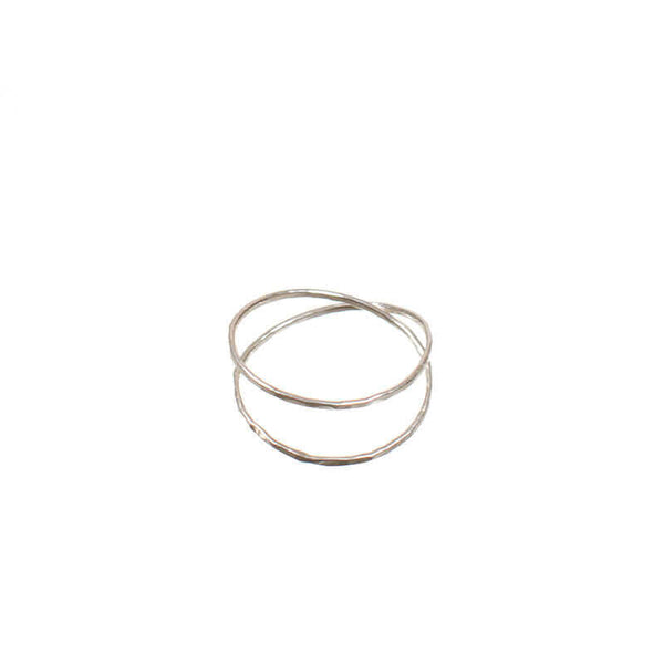 Silver ring with two loops of wire crossing.