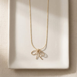 MINNA BOW PENDANT NECKLACE