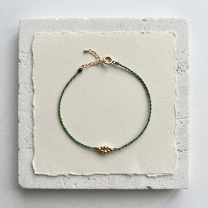 RHODAS BUBBLES BRAIDED STRING BRACELET