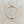 RHODAS BUBBLES BRAIDED STRING BRACELET
