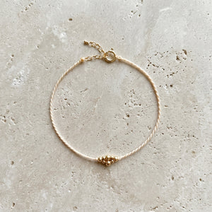 RHODAS BUBBLES BRAIDED STRING BRACELET