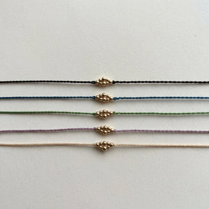 RHODAS BUBBLES BRAIDED STRING BRACELET