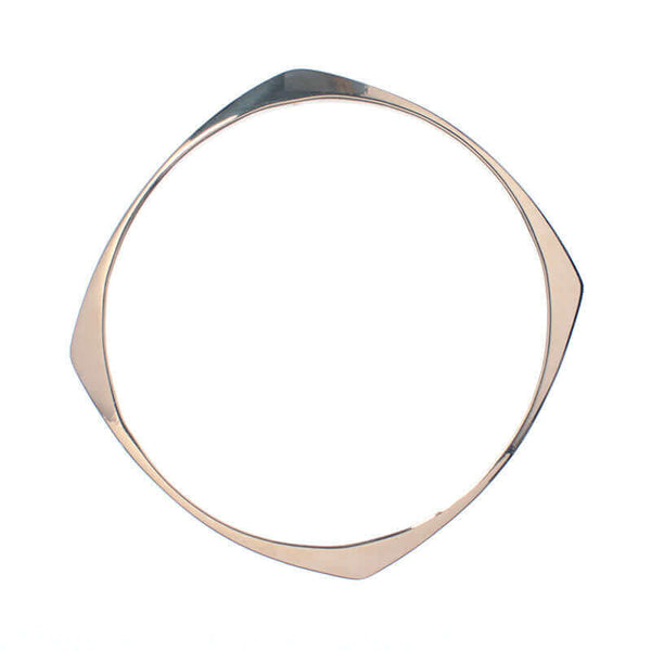 Silver bangle with rounded square shape.