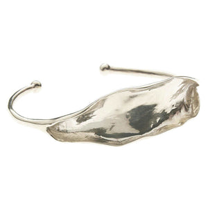 Open cuff polished white bronze bracelet with organic leaf motif.