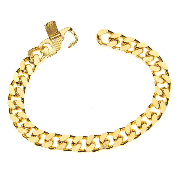 Chunky gold curb chain bracelet with unique lay flat clasp.