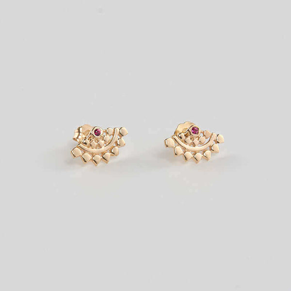 Pair of fan-shaped gold earrings with lace pattern, inset with small ruby.