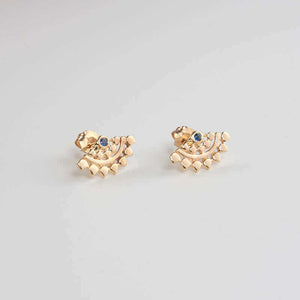 Pair of fan-shaped gold earrings with lace pattern, inset with small sapphire.