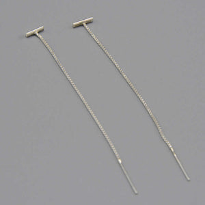 Pair of silver threader earrings, small bar with fine gold chain ending in bar.