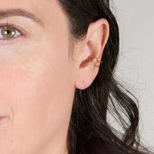 A Woman Wearing Ear Cuff Earring