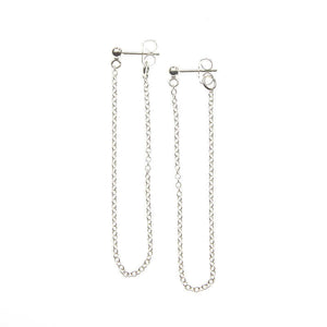 Pair of silver earrings, long loop of delicate chain on a post.