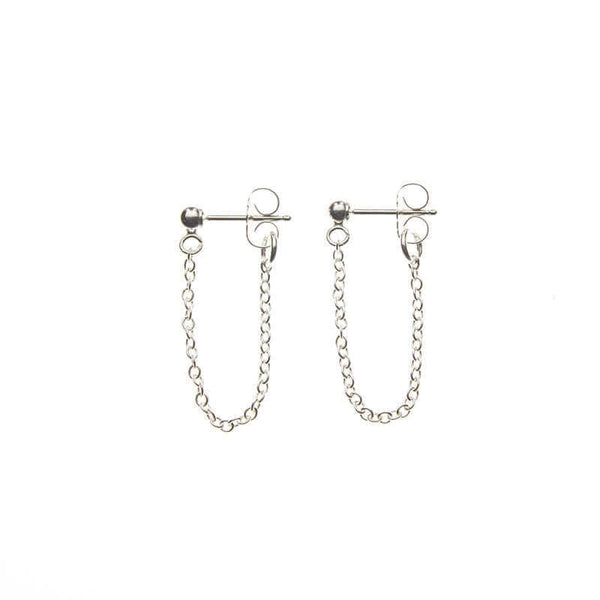 Pair of silver earrings, short loop of delicate chain on a post.