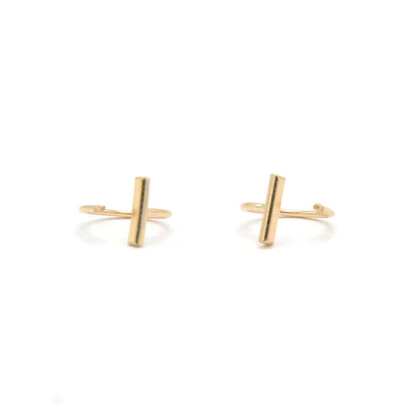 Pair of gold earrings, flat bar in front with curved wire hoop.