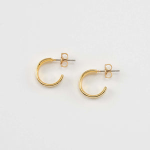 Pair of small gold open hoop earrings on posts.