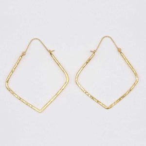 Pair of gold geometric rhombus shaped hoop earrings.