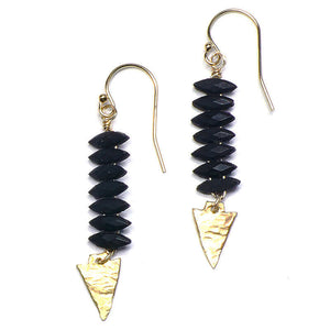 Pair of gold earrings with black beads and hammered arrowhead detail at bottom.