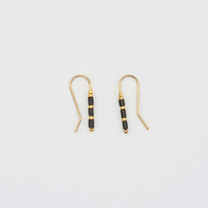 Pair of small gold wire earrings with black and gold beads.