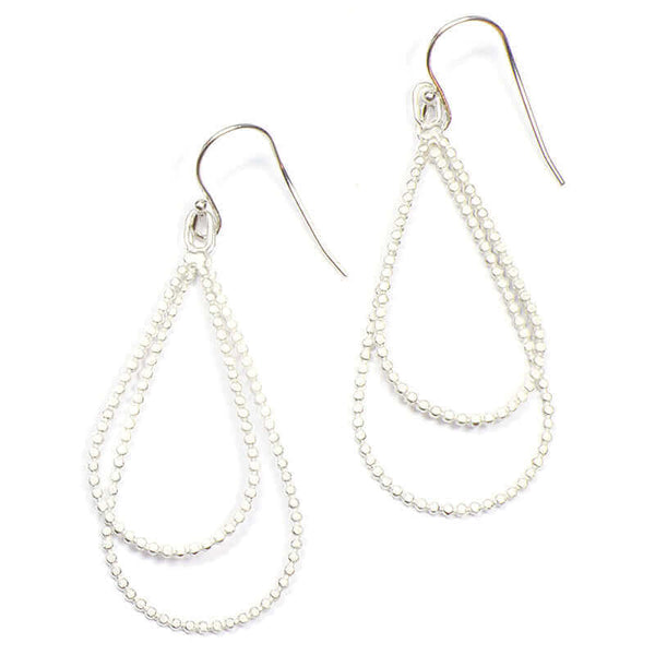 Pair of silver beaded wire  teardrop shaped earrings on earwire.