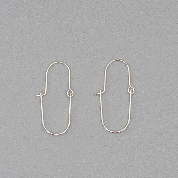 Pair of silver hoop style earrings with curved bar on wire.