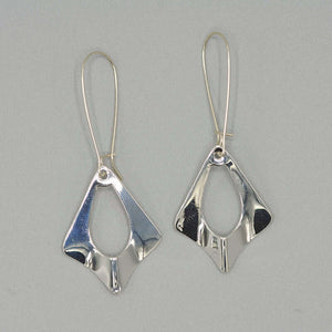 Pair of silver earrings, flat diamond shape with oval cutout on french earwire.