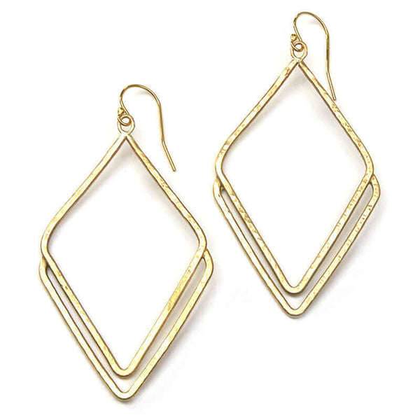 Pair of gold rhombus shaped earrings.