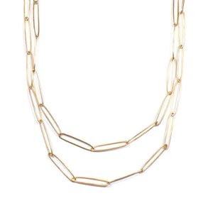 Gold elongated link necklace with clean modern design shown doubled up.