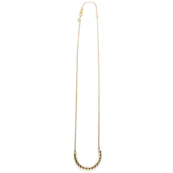 Gold chain with half-circle beaded bar as pendant, full length showing clasp..