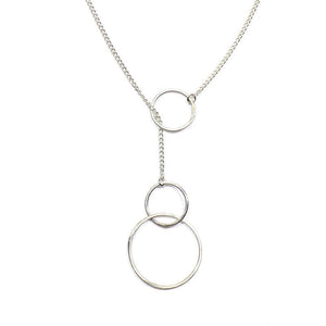 Close-up of silver chain necklace with hoops are at end that slide for adjustment.