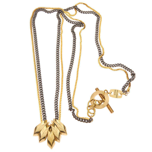Gold and dark multi-chain necklace with 5 heavy brass links as pendant.