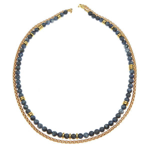 Necklace of chunky gold chain with white river stones and brass beads, shown doubled up.