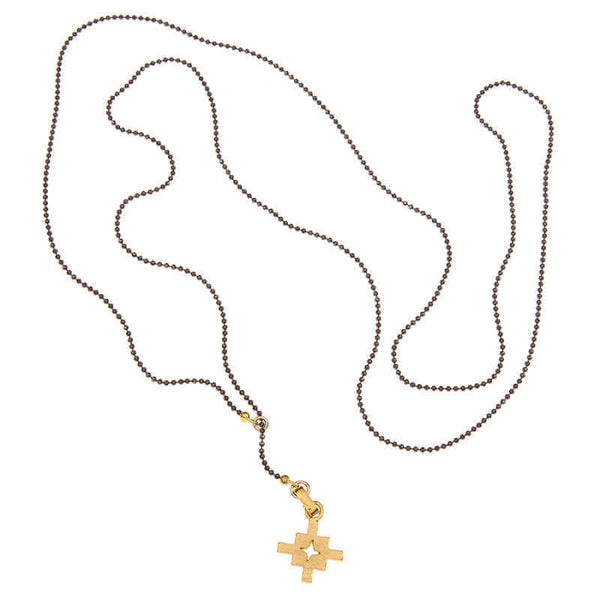 Dark bead chain necklace with small geometric cross shaped pendant and slider.