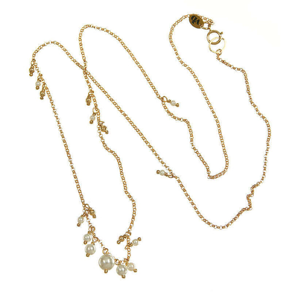 Gold necklace with small pearls on side and cluster of pearls as pendant.