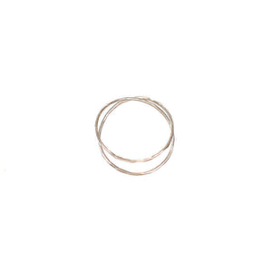 Silver ring with two loops of wire crossing.